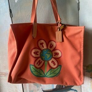 Coach Orange Tote Bag with Structured Design